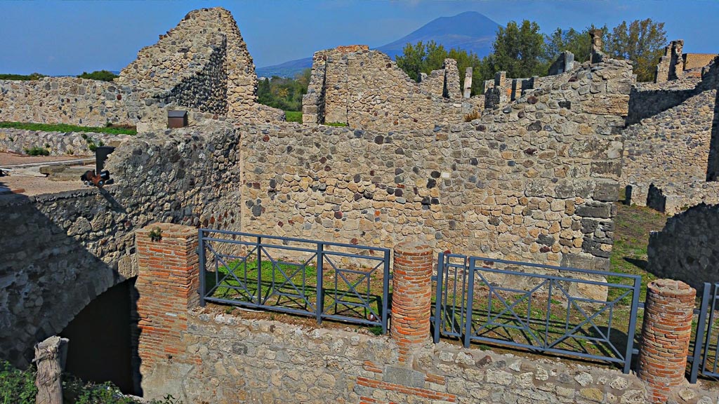 VII.16.1 Pompeii. 2017/2018/2019. Looking north-west from Temple of Venus towards entrance doorway, on right.
The east end of the Porta Marina is on the lower left. Photo courtesy of Giuseppe Ciaramella.