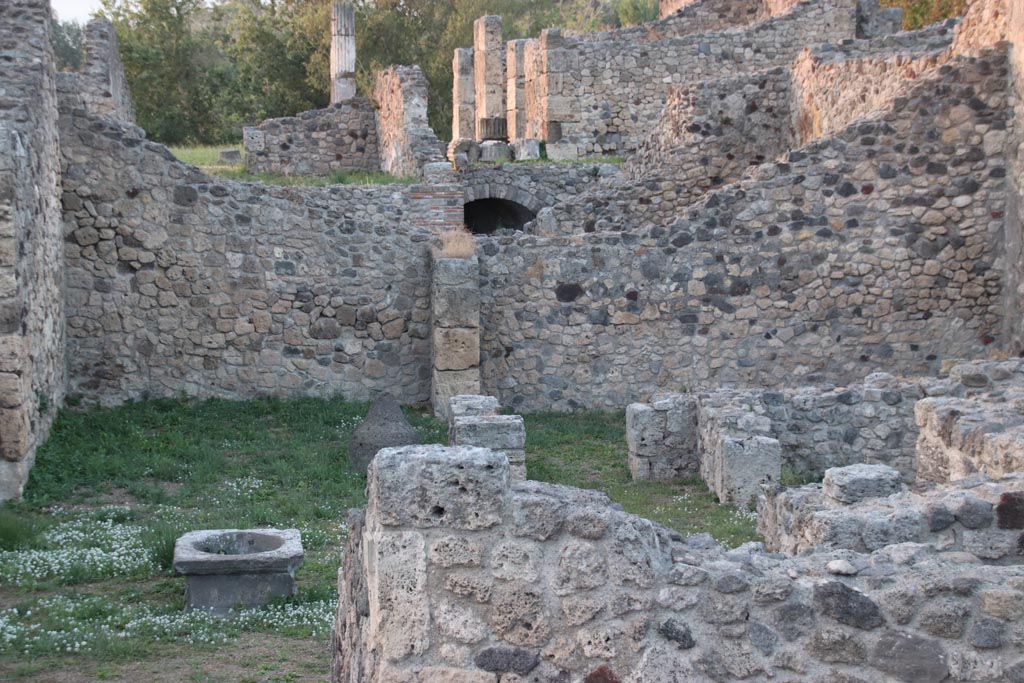VII.16.1 Pompeii. October 2023. 
Looking towards east side of atrium, with tablinum, on left, triclinium in rear right, cubiculum, on right. Photo courtesy of Klaus Heese.