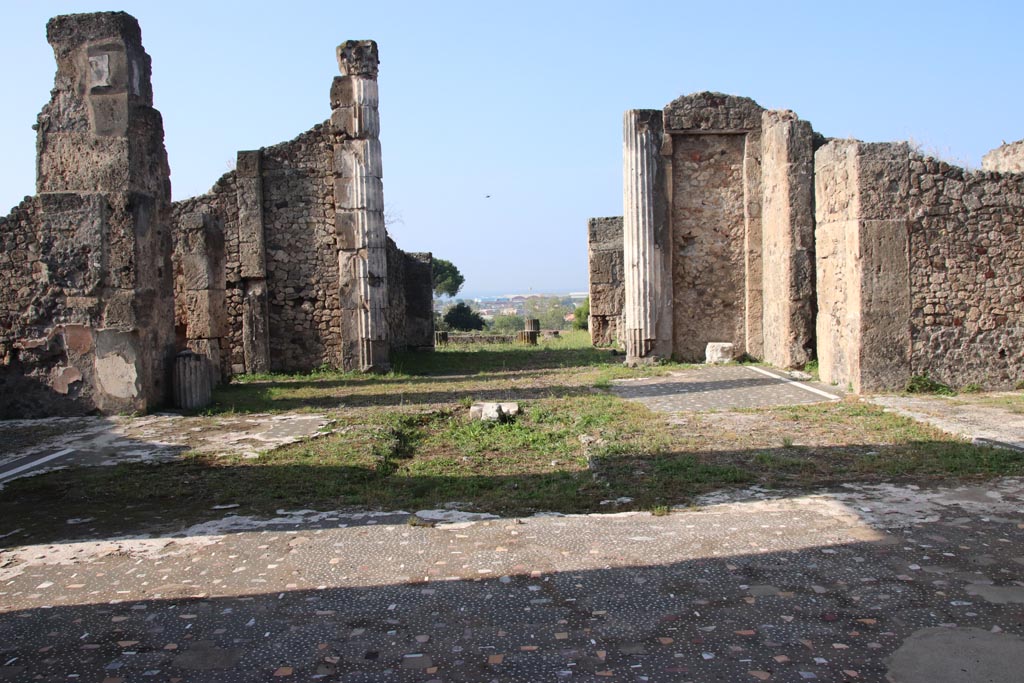 VII.16.13 Pompeii. October 2023. 
Looking west across site of impluvium in atrium 2, towards tablinum 9. Photo courtesy of Klaus Heese.