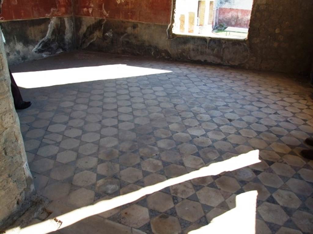 VII.16.17-22 Pompeii. December 2007. Oecus with marble tiled floor. 
Looking south through window towards hanging garden area. This room also had a window in its west wall, with view of gardens and onto Bay of Naples.