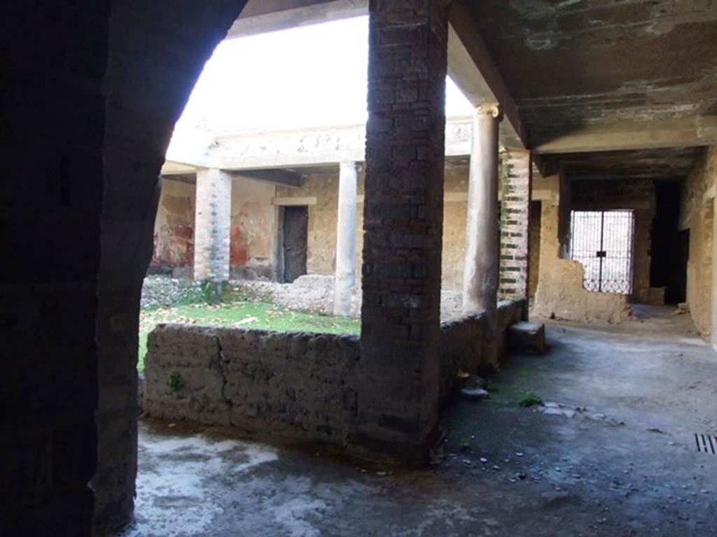 VII.16.17-22 Pompeii. December 2007. 
Peristyle garden looking south towards entrance VII.16.17 in House of Maius Castricius.. According to Jashemski, this was the peristyle garden reached easily from the Vicolo dei Soprastanti. The peristyle portico was supported by pillars at the corners and by a column in the middle of each of the four sides. A low wall built between the columns and pillars, was broken by an entrance into the garden on the north wall. See Jashemski, W. F., 1993. The Gardens of Pompeii, Volume II: Appendices. New York: Caratzas. (p.203, B, and Fig 236)