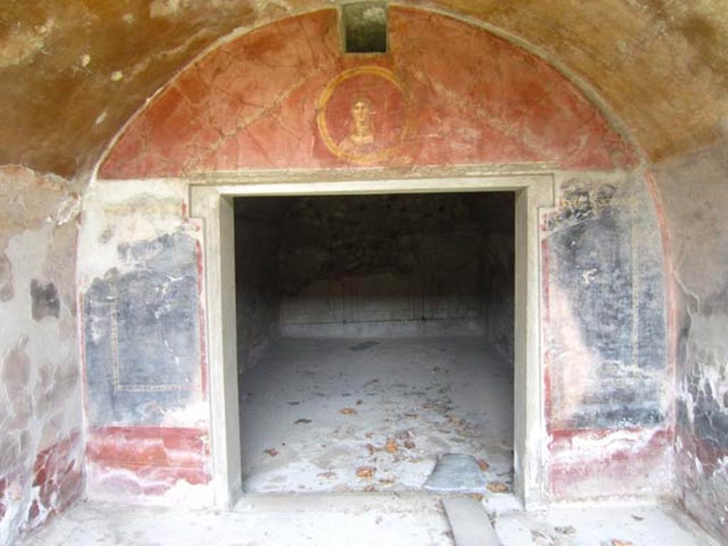 VII.16.17-22 Pompeii. May 2012.  Looking north across room with vaulted ceiling, from peristyle in House of Maius Castricius, with doorway into a rear room. Photo courtesy of Marina Fuxa.