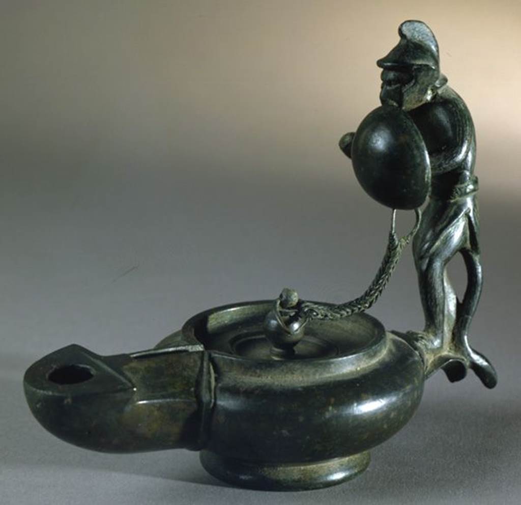 VI.16.19 Pompeii.  Bronze lamp with a monkey in Gladiators armour. SAP 13958.