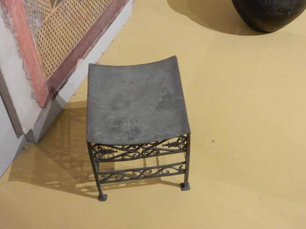 VII.16.17-22 Pompeii. May 2018. 
Bronze stool decorated with palms and lotus flowers. Archaeological Park of Pompeii, inv. 13355. 
Photo courtesy of Buzz Ferebee.