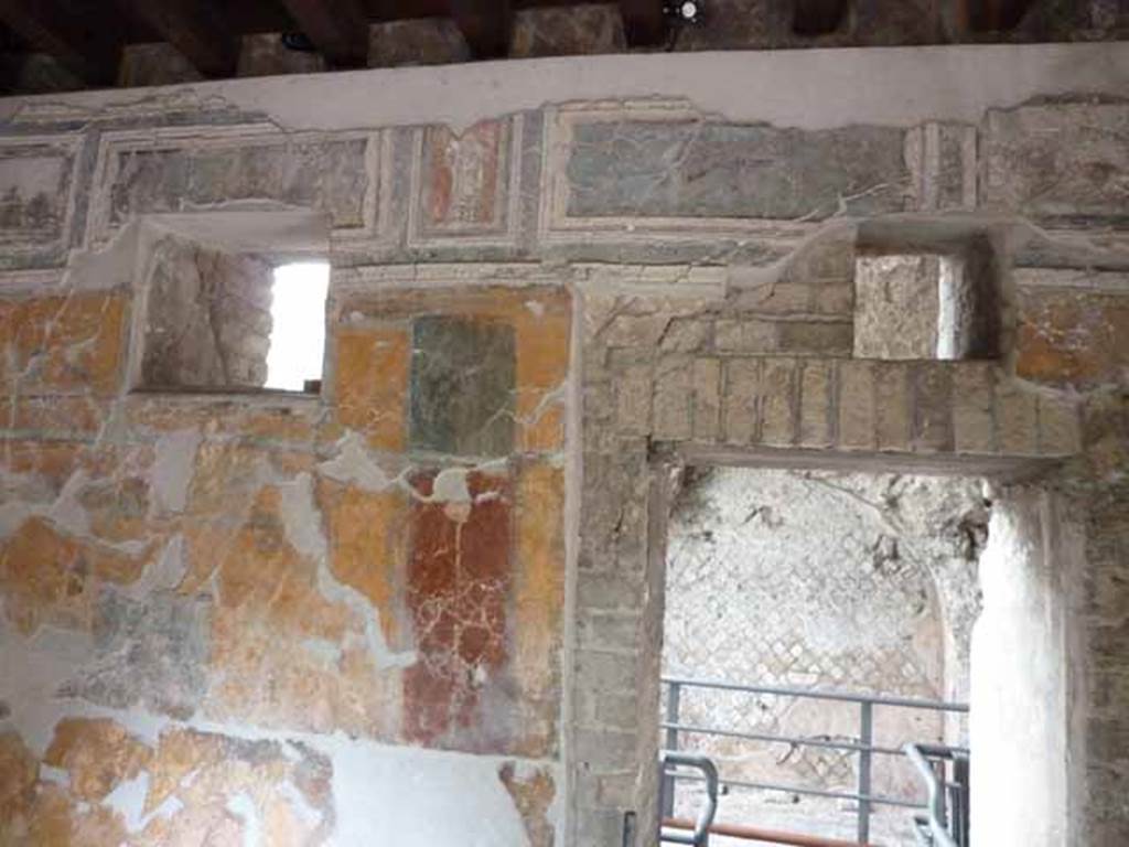 VII.16.a Pompeii. May 2010. Room 1, upper east wall, and doorway to room 3.