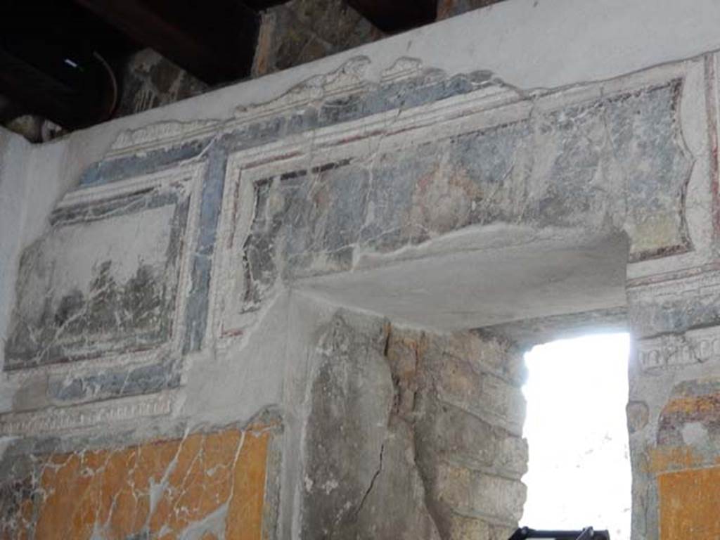 VII.16.a Pompeii. May 2015. Room 1, detail of paintings near window in east wall.
Photo courtesy of Buzz Ferebee.