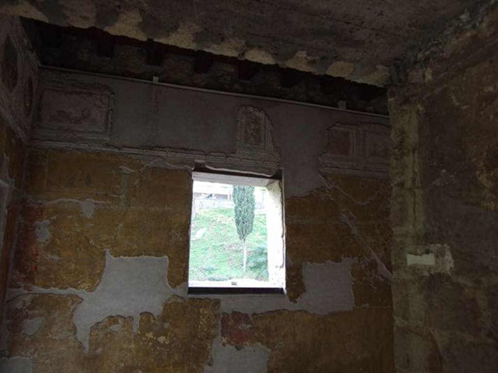 VII.16.a Pompeii. December 2006. Room 1, west wall with painted decoration and stucco work.