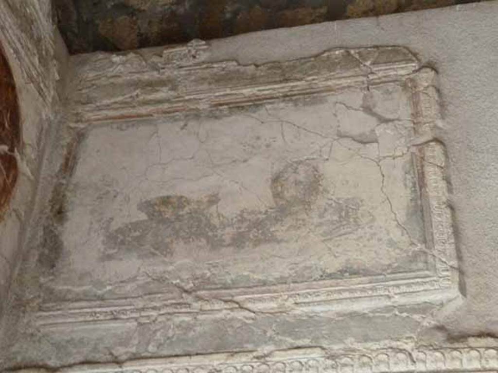 VII.16.a Pompeii. May 2010. Room 1, plasterwork and painting on the west wall in south-west corner.