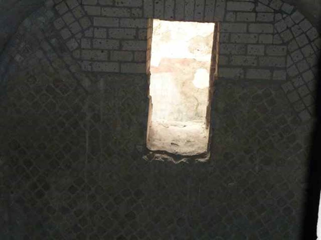 VII.16.a Pompeii. May 2010.  Looking through hole in rear wall, across room 13 towards window in east wall of room 9, natatio.