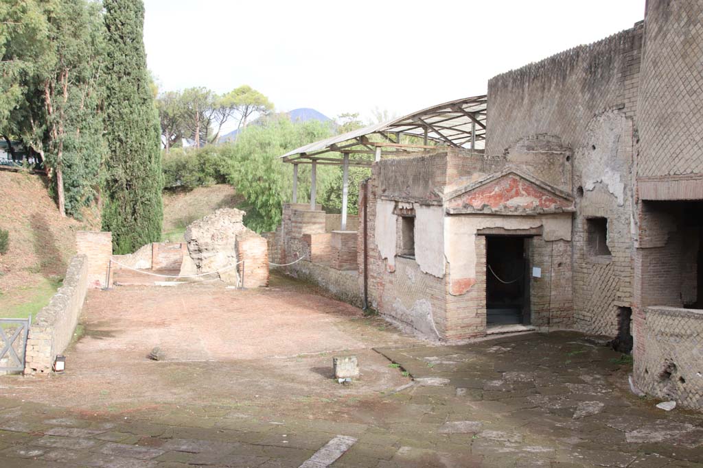 VII.16.a Pompeii. October 2020. Looking north across Courtyard C to remains of room on west side of room 2, the hot pool. 
Photo courtesy of Klaus Heese.