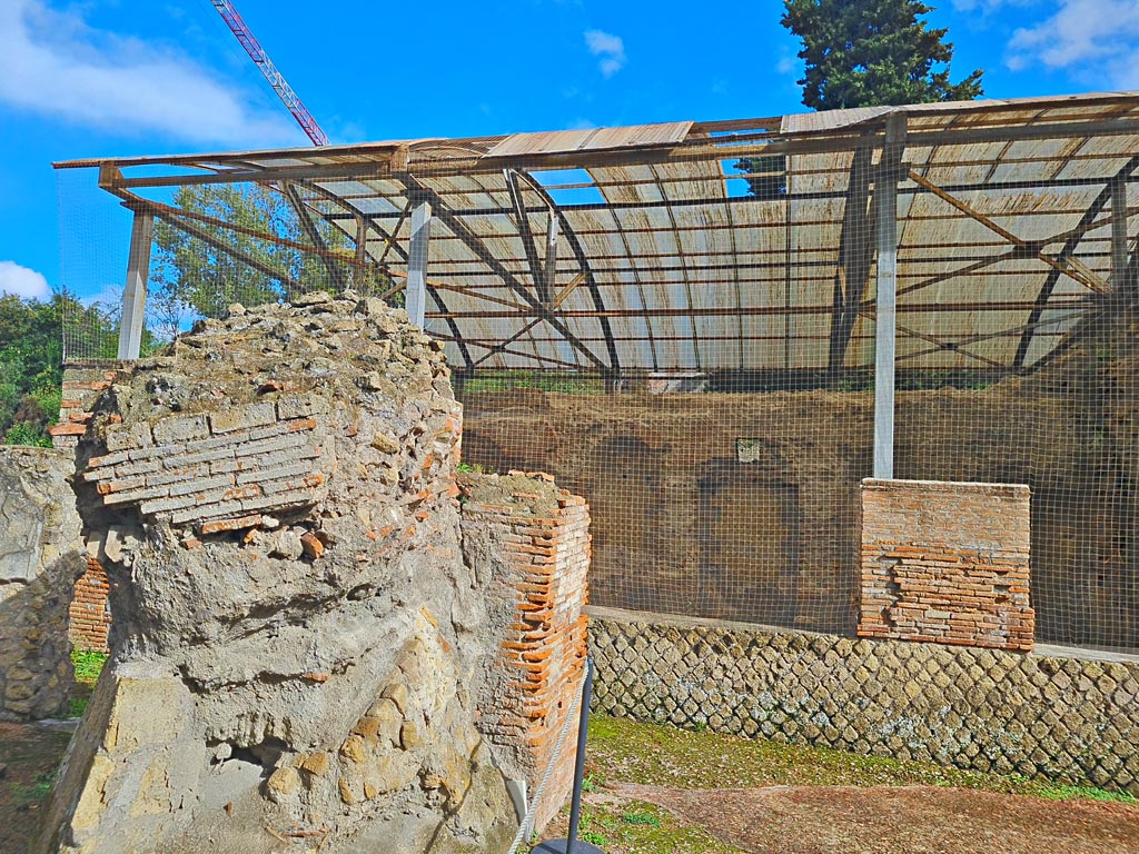 VII.16.a Pompeii. November 2023. 
Looking east towards remains of large piece of debris from the eruption. Photo courtesy of Giuseppe Ciaramella.