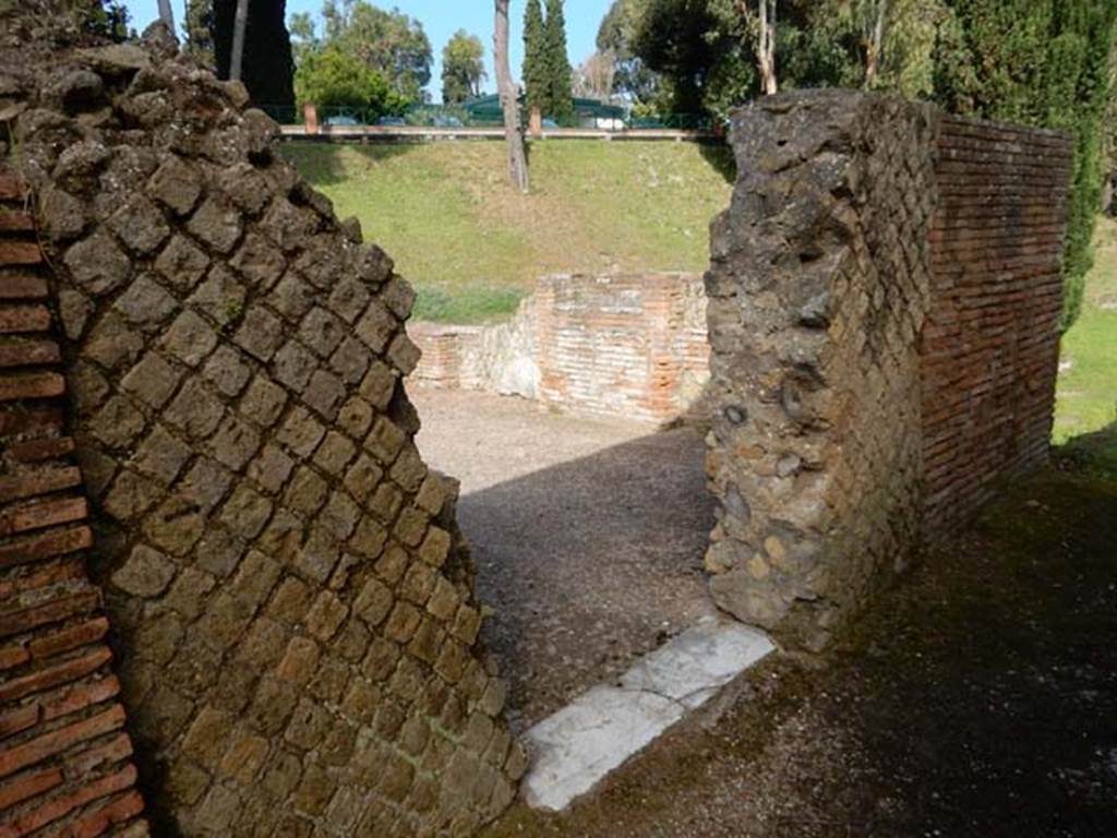 VII.16.a Pompeii. May 2015. Looking north-west through doorway into room at the north end of courtyard C.  Photo courtesy of Buzz Ferebee.