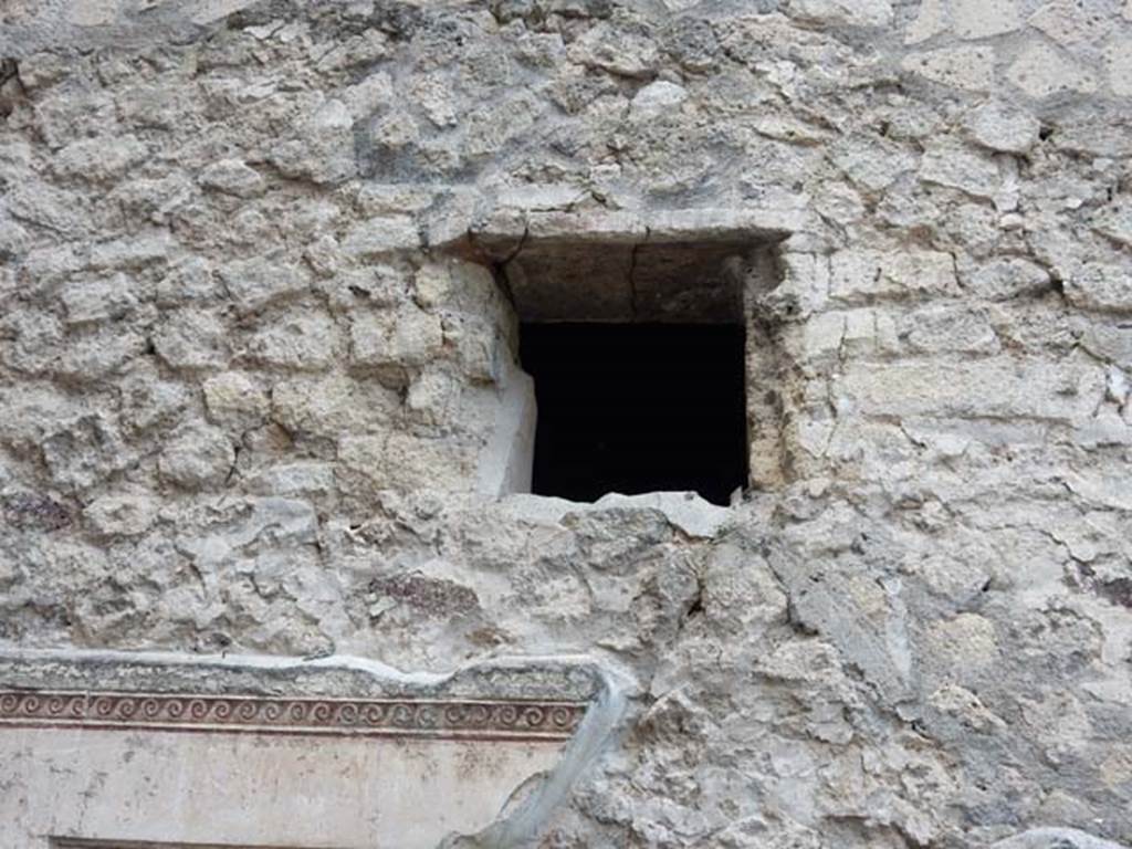 VII.16.a Pompeii. May 2015. Small window above remaining decorative stucco. 
Photo courtesy of Buzz Ferebee.