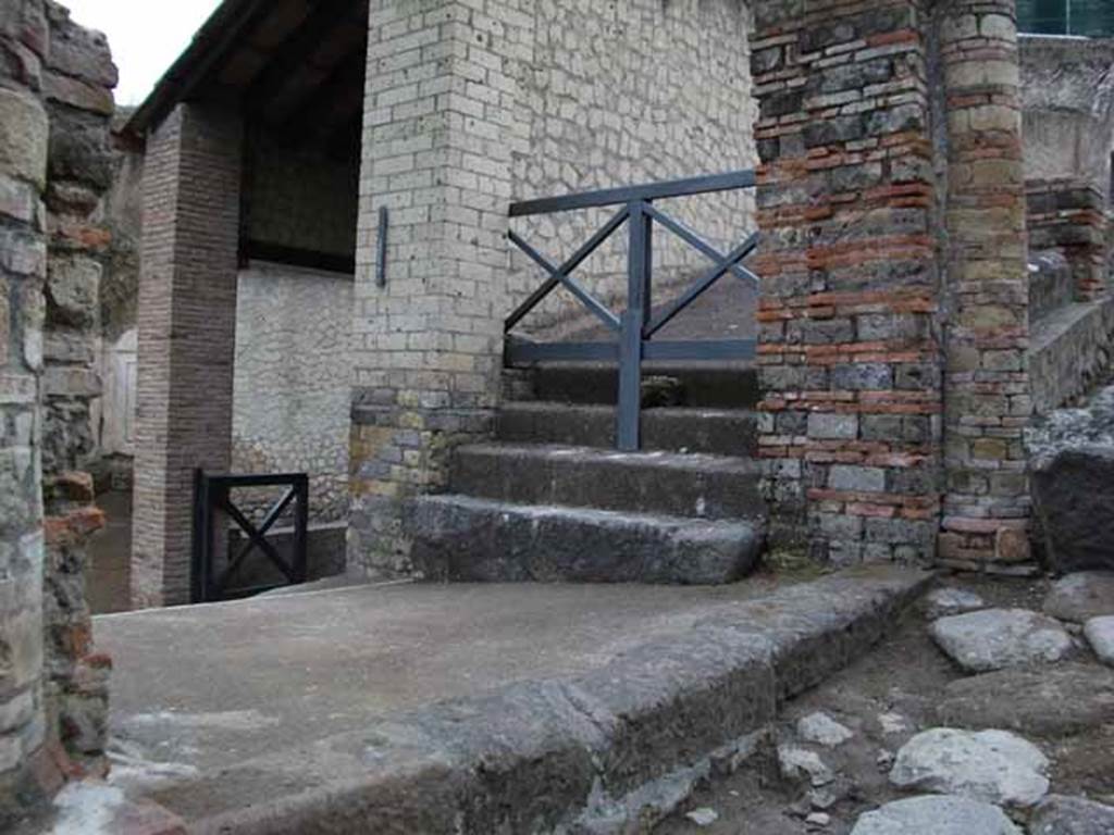VII.16.a Pompeii. May 2010.  Upper steps that would have led east, under the exterior portico.  The entrance to corridor B can be seen on the left.