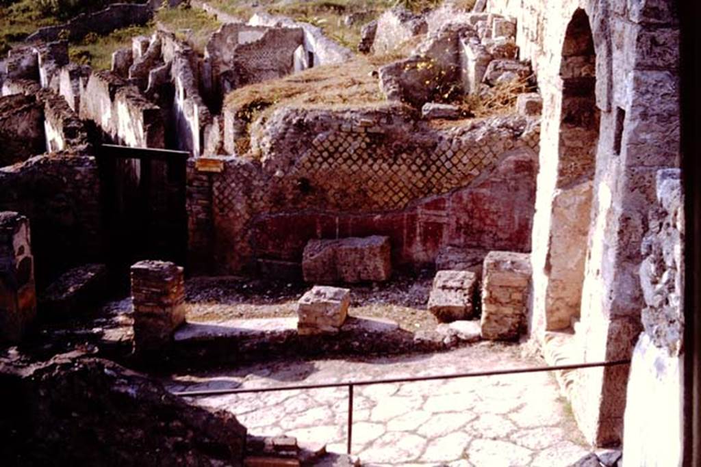 VII.16.a Pompeii. 1964. Looking north towards exterior wall near doorway, on left, and Porta Marina, on right. Photo by Stanley A. Jashemski.
Source: The Wilhelmina and Stanley A. Jashemski archive in the University of Maryland Library, Special Collections (See collection page) and made available under the Creative Commons Attribution-Non Commercial License v.4. See Licence and use details.
J64f1737