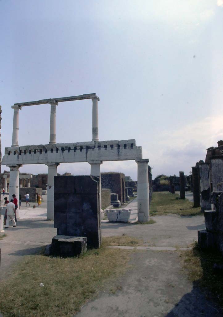 VIII.1.1 Pompeii, July 1980. Looking east from Basilica across south end of Forum. 
Photo courtesy of Rick Bauer, from Dr George Fay’s slides collection.