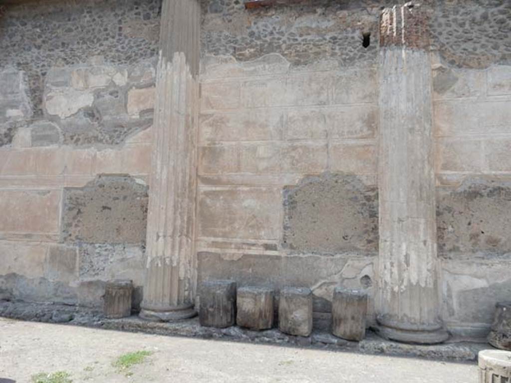 VIII.1.1 Pompeii, May 2018. Basilica, remains of half-round columns and stucco plaster on north wall in north-west corner. Photo courtesy of Buzz Ferebee.