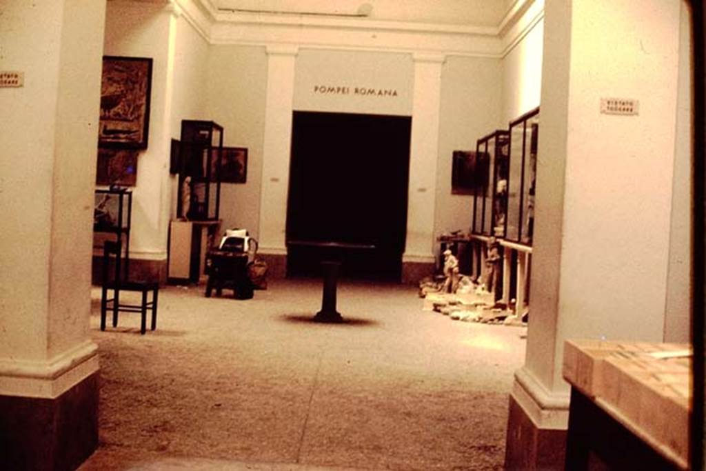 VIII.1.4 Pompeii Antiquarium. 1978. Room III with frescoes, marble statues and bronze basin on a pillar. Photo by Stanley A. Jashemski.   
Source: The Wilhelmina and Stanley A. Jashemski archive in the University of Maryland Library, Special Collections (See collection page) and made available under the Creative Commons Attribution-Non-Commercial License v.4. See Licence and use details.
J78f0094