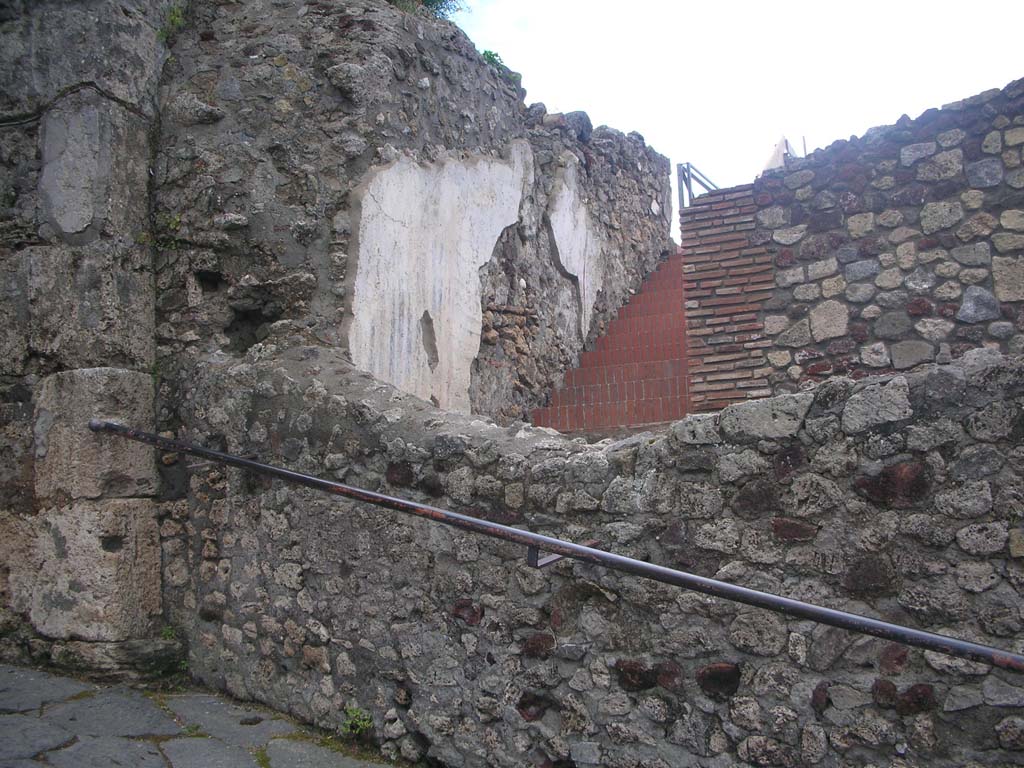 VIII.1.4 Pompeii Antiquarium/Porta Marina, Pompeii. May 2011. 
Looking south on the west side of the gate towards steps up to Larario dei Pompeianisti. Photo courtesy of Ivo van der Graaff.