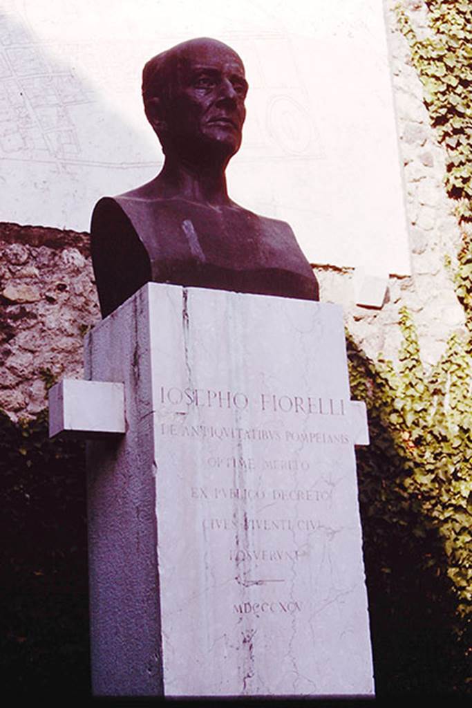 Larario dei Pompeianisti. Pompeii. 1964.  Bust of Iosepho Fiorelli.  
Photo by Stanley A. Jashemski.
Source: The Wilhelmina and Stanley A. Jashemski archive in the University of Maryland Library, Special Collections (See collection page) and made available under the Creative Commons Attribution-Non Commercial License v.4. See Licence and use details.
J64f1739