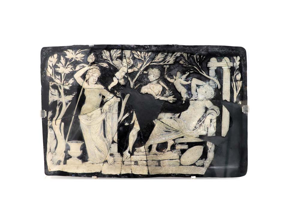 VIII.1.4 Pompeii. February 2021. 
Glass cameo panel decorating furniture and depicting Bacchus and Ariadne, found in the House of Fabius Rufus, VII.16.17-22, room 62.
Photo courtesy of Fabien Bièvre-Perrin (CC BY-NC-SA).