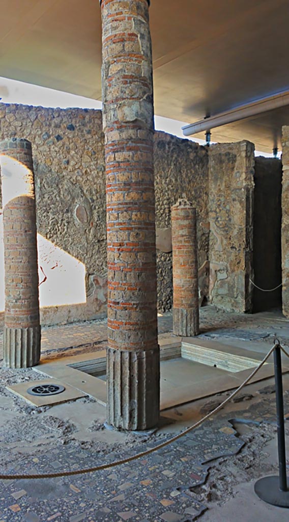 VIII.2.1 Pompeii. 2017/2018/2019
Looking across impluvium in atrium towards doorway to room in north-west corner of atrium. 
Photo courtesy of Giuseppe Ciaramella.