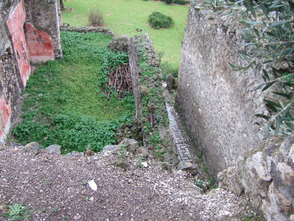 VIII.2.1 Pompeii. December 2005. 
Triclinium of VIII.2.3/VIII.2.16 (?) on the lower level, on left, with corridor on lower level belonging to VIII.2.1, on right.