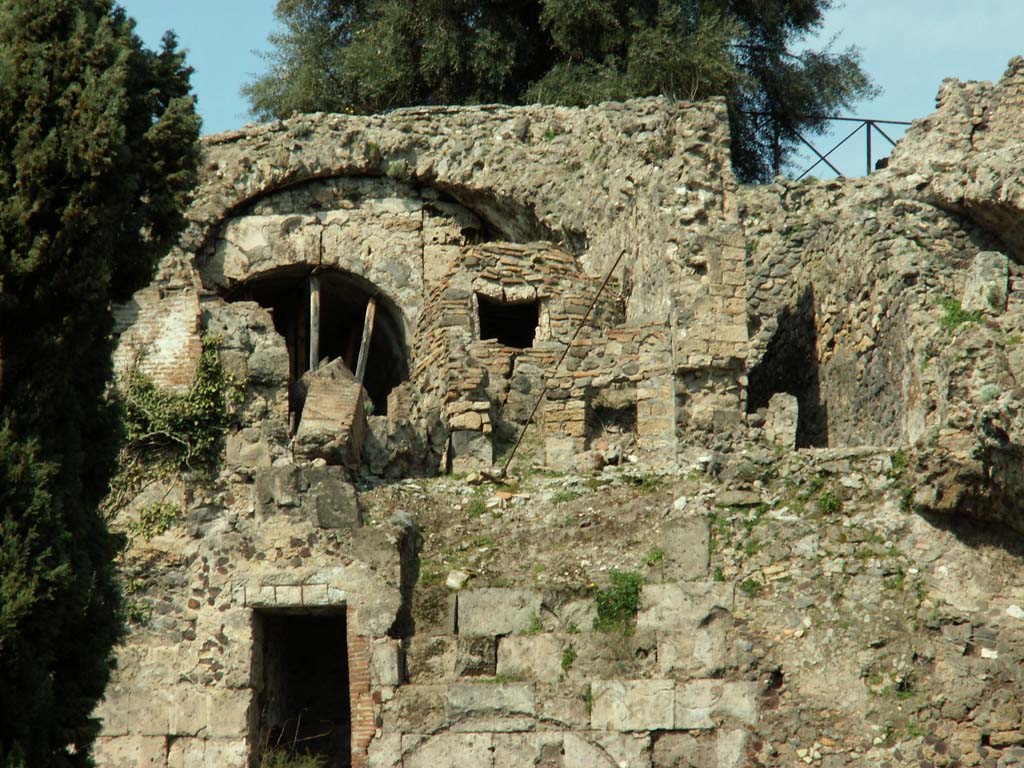 Rear of VIII.2.1 Pompeii. March 2009. 
Looking north towards the room with a vaulted ceiling and an oven, on the floor below the south portico seen on the present top level.
Photo courtesy of Sandra Zanella.