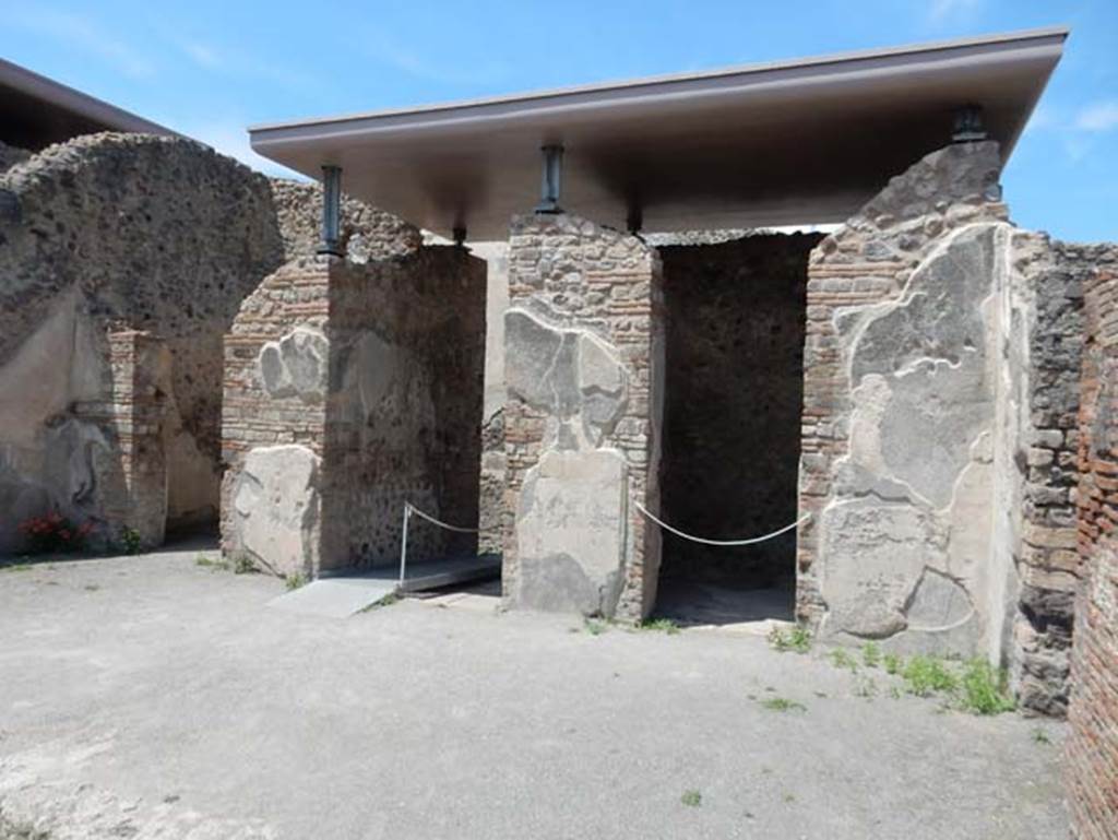 VIII.2.3 Pompeii. May 2018. Rooms on north side of atrium.
Doorway to cubiculum, on left, entrance corridor, cubiculum on east of entrance corridor, and to cubiculum in north-east corner on east side of atrium, on right.
Photo courtesy of Buzz Ferebee.