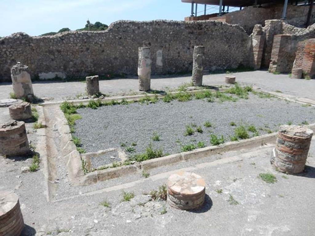 VIII.2.3 Pompeii. May 2018. 
Looking towards north-west corner of peristyle garden with doorway to small room, on right. Photo courtesy of Buzz Ferebee.