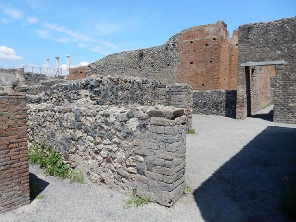 VIII.2.3 Pompeii. May 2018. Looking north-east across rear of VIII.2.5, towards west wall of VIII.2.6 from north-east corner of peristyle. Photo courtesy of Buzz Ferebee.