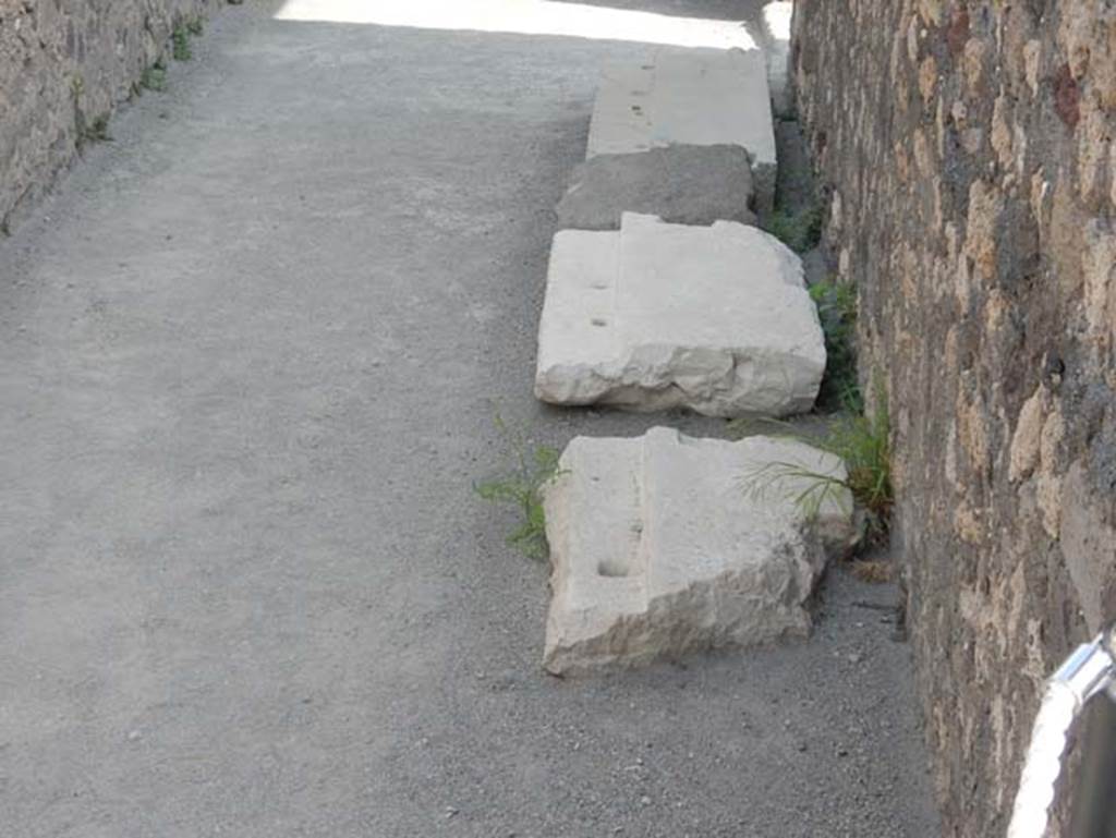 VIII.2.7/13/14 Pompeii. May 2017. Deposits in passageway, near doorway to VIII.2.13.
Photo courtesy of Buzz Ferebee.