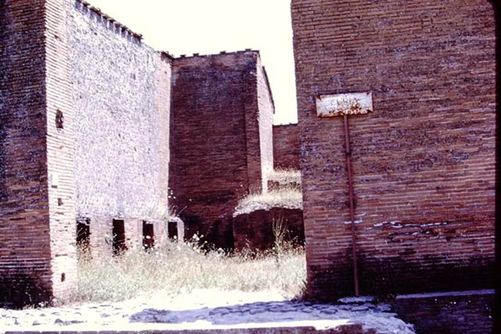 VIII.2.8 Pompeii. 1977. Looking south-east. Photo by Stanley A. Jashemski. The name-plaque at the entrance gives the appellation “Curia” with further words underneath which cannot be read.  
Source: The Wilhelmina and Stanley A. Jashemski archive in the University of Maryland Library, Special Collections (See collection page) and made available under the Creative Commons Attribution-Non-Commercial License v.4. See Licence and use details.
J77f0558