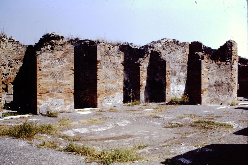 VIII.2.16 Pompeii. 1968. Looking towards north-east corner of atrium.  
On the north wall are the doorways to cubiculum with windowed niche, on left, the corridor, and a cubiculum.
On the east side is the doorway to another cubiculum, on the north side of the entrance corridor.  Photo by Stanley A. Jashemski.
Source: The Wilhelmina and Stanley A. Jashemski archive in the University of Maryland Library, Special Collections (See collection page) and made available under the Creative Commons Attribution-Non-Commercial License v.4. See Licence and use details.
J68f1229