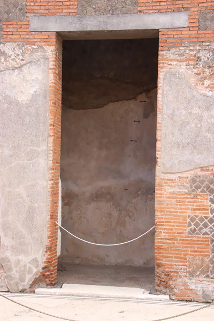 VIII.2.16 Pompeii. May 2024. 
Doorway to cubiculum in centre of south wall of atrium. Photo courtesy of Klaus Heese.