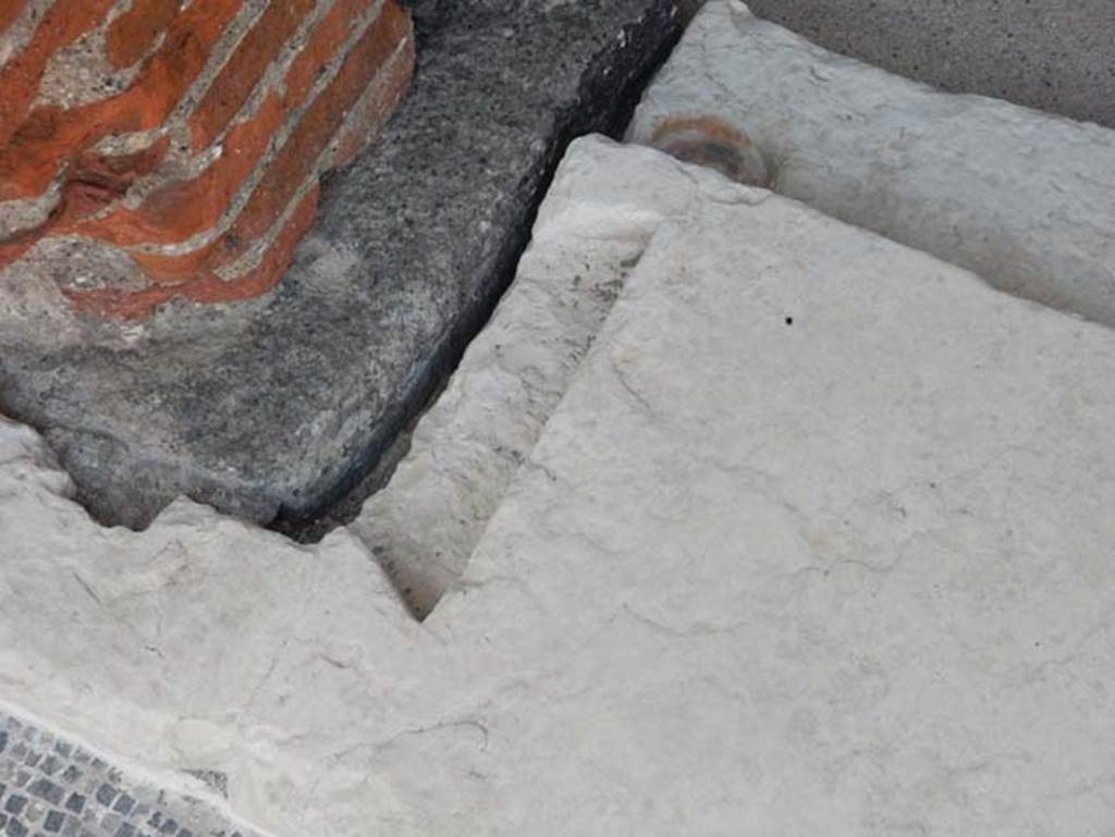 VIII.2.16 Pompeii. May 2017.  Detail of east side of doorway threshold to central cubiculum.  Photo courtesy of Buzz Ferebee.