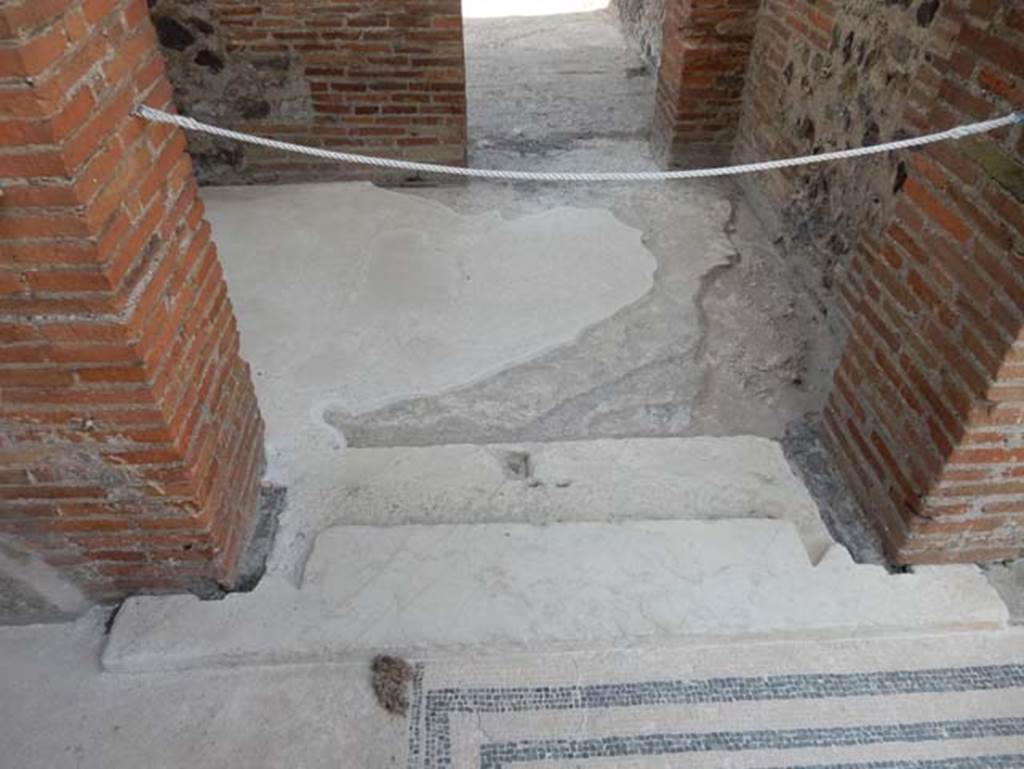VIII.2.16 Pompeii. May 2017. Looking west through doorway in south-west corner of atrium, leading into a passageway and through another doorway to a room overlooking the east portico.  Photo courtesy of Buzz Ferebee.