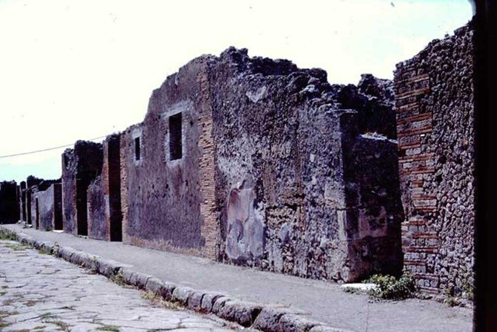 VIII.2.16 Pompeii, on left with white marble sill. 1968. West side of Via delle Scuole, looking south. 
The marble sill of the entrance doorway on the right belongs to VIII.2.13. Photo by Stanley A. Jashemski.
Source: The Wilhelmina and Stanley A. Jashemski archive in the University of Maryland Library, Special Collections (See collection page) and made available under the Creative Commons Attribution-Non-Commercial License v.4. See Licence and use details.
J68f1187