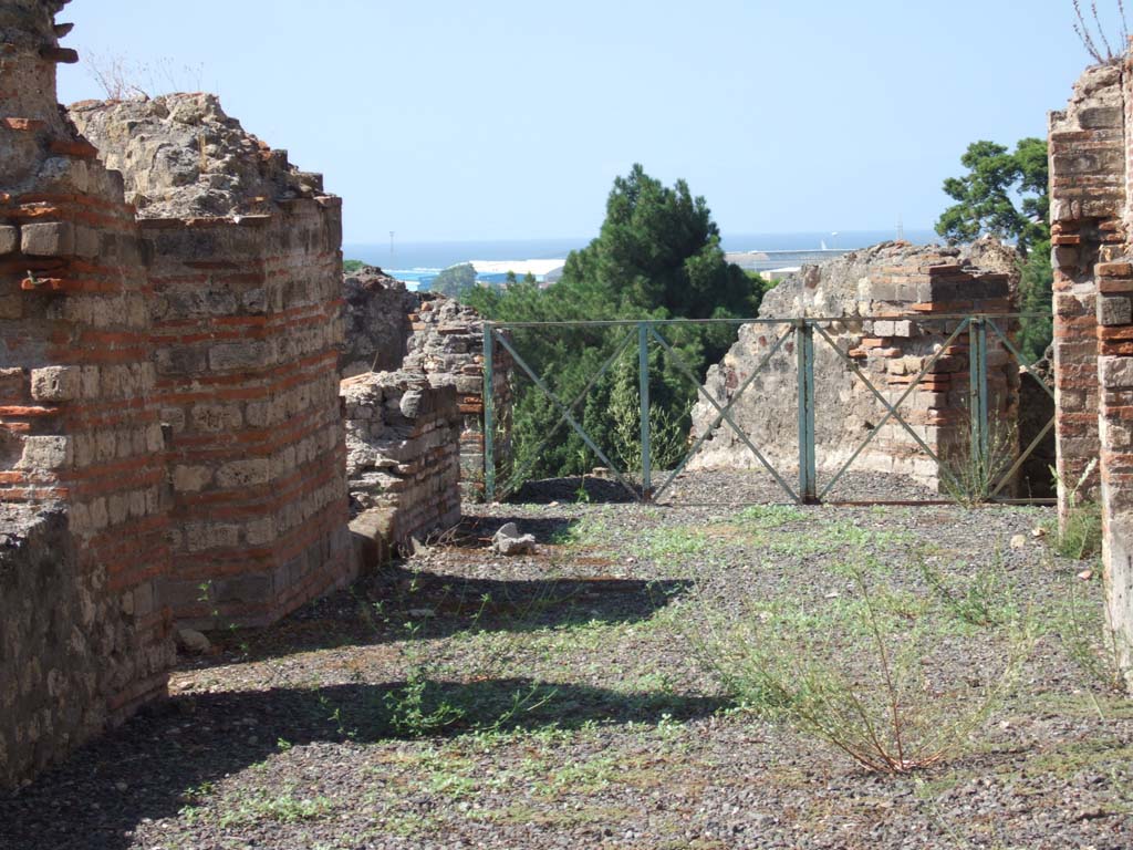 VIII.2.20 Pompeii. September 2005. Area at end of corridor.
According to Jashemski, this block of dwellings was built on five levels, and had three porticoed terraces on the rear.
The upper (4th) terrace was not preserved. 
See Jashemski, W. F., 1993. The Gardens of Pompeii, Volume II: Appendices. New York: Caratzas. (p.207)