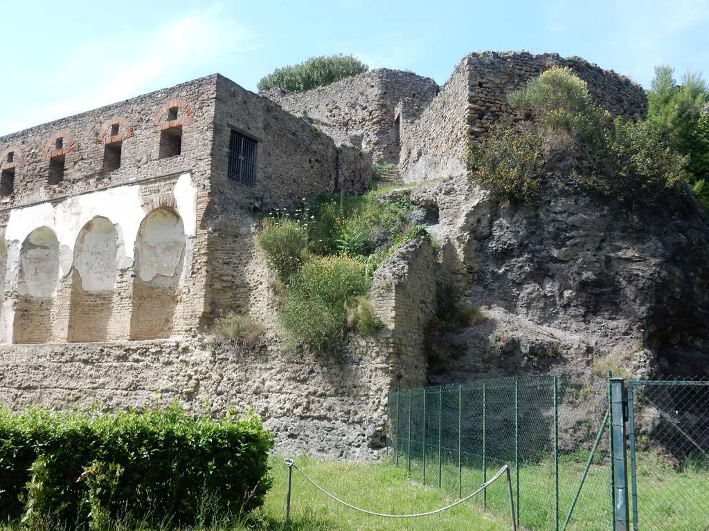 VIII.2.20 Pompeii. June 2019. Rear of Sarno baths, east end. VIII.2.21, on right.
Photo courtesy of Buzz Ferebee.