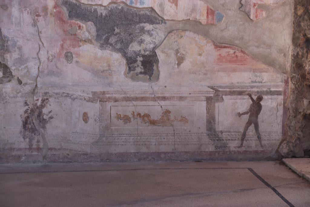 VIII.2.23 Pompeii. October 2022. Detail of the painted zoccolo/dado at the west end of the south wall. Photo courtesy of Klaus Heese.