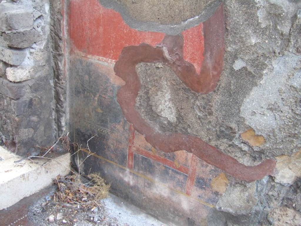 VIII.2.26 Pompeii. September 2005. Painted wall decoration from west wall of entrance ‘a’.