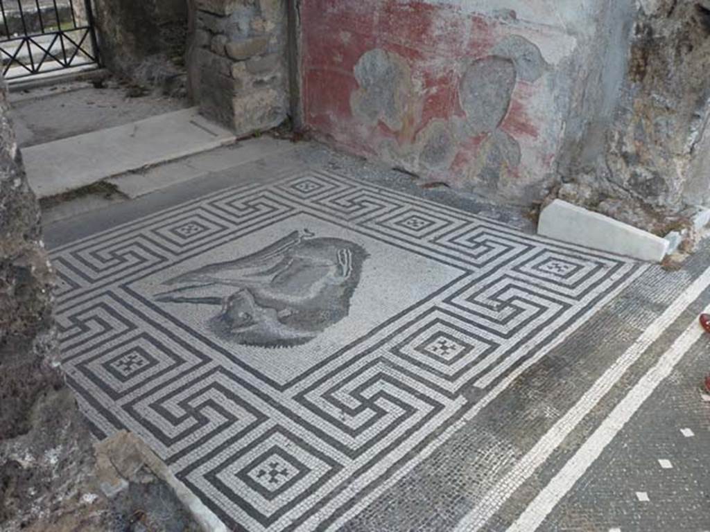 VIII.2.26 Pompeii. September 2011. Mosaic and painted wall decoration on east wall of vestibule ‘b’.