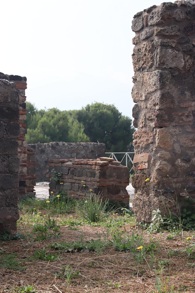 VIII.2.27 Pompeii. October 2023. 
Looking through doorway from south side of kitchen into room on east side of atrium of VIII.2.26.
Photo courtesy of Klaus Heese.