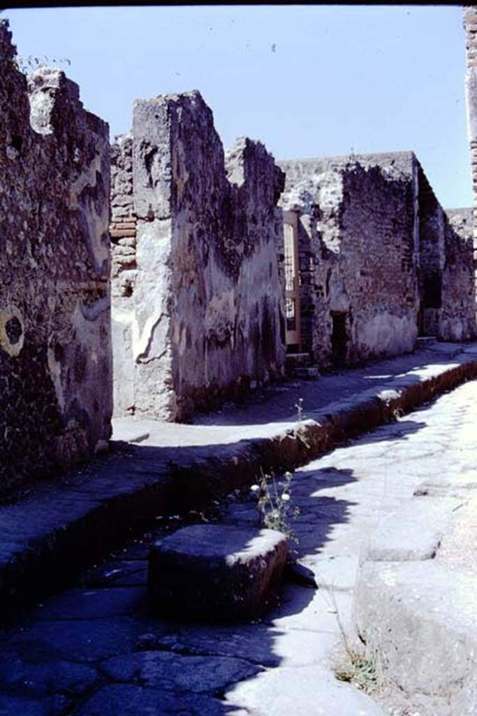 VIII.2.28 Pompeii, on left. 1968. Looking west along south side of Via della Regina, to doorways of VIII.2.28, 27 and 26. Photo by Stanley A. Jashemski.
Source: The Wilhelmina and Stanley A. Jashemski archive in the University of Maryland Library, Special Collections (See collection page) and made available under the Creative Commons Attribution-Non Commercial License v.4. See Licence and use details.
J68f1066