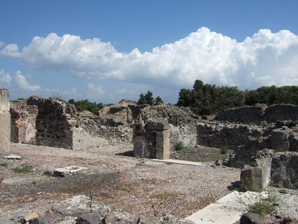 VIII.2.28 Pompeii. September 2005. Rooms on east side of atrium, cubiculum, east ala and another cubiculum. According to Richardson, in tetrastyle atria the alae are located in the centre of each side, and here they were originally framed with pilasters.
See Richardson, L., 1988. Pompeii: an Architectural History. Baltimore: John Hopkins University Press. (p.231-2).