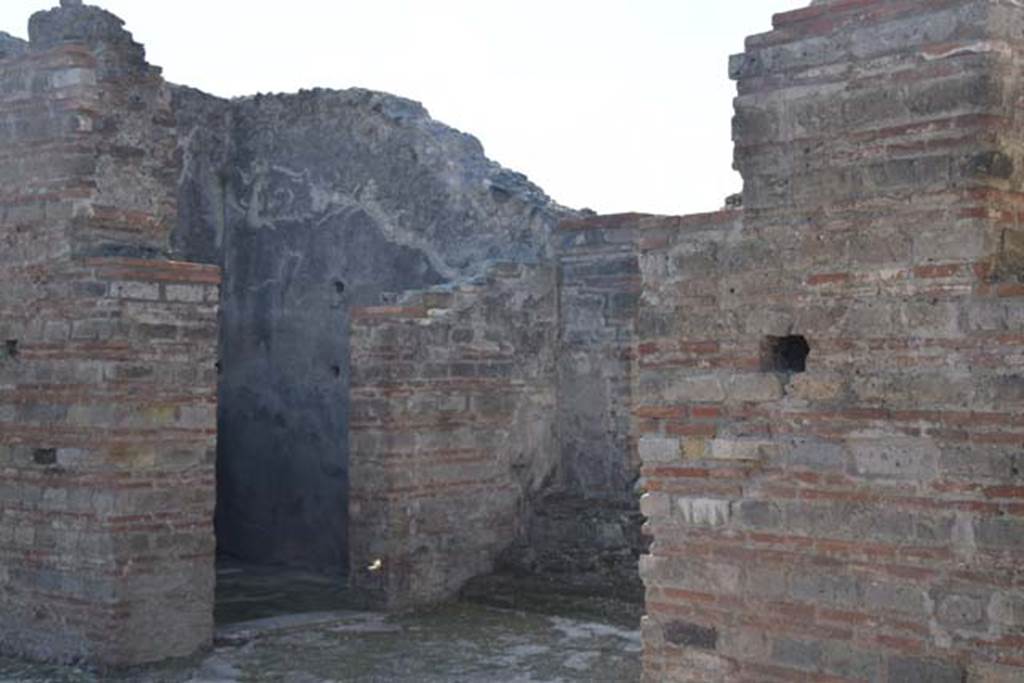 VIII.2.30 Pompeii. November 2016. West side of atrium, with doorway to cubiculum, and opening leading to steps linking to VIII.2.29.  Photo courtesy of Marie Schulze.