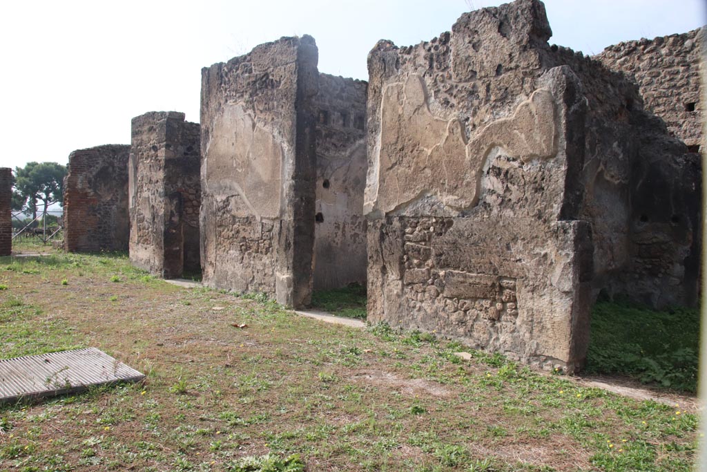 VIII.2.34 Pompeii. October 2023. 
Looking south along west side of atrium, with doorway to room ‘o’ on left, followed by west ala ‘i’, and doorways to ‘k’, ‘l (L)’ , and ‘q’, on right.
Photo courtesy of Klaus Heese.