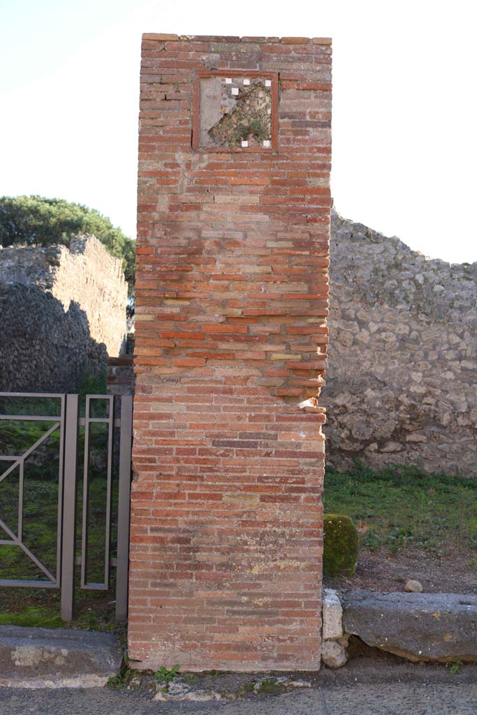 VIII.3.6 Pompeii, on left, and VIII.3.5, on right. December 2018. 
Pilaster between doorways. Photo courtesy of Aude Durand.