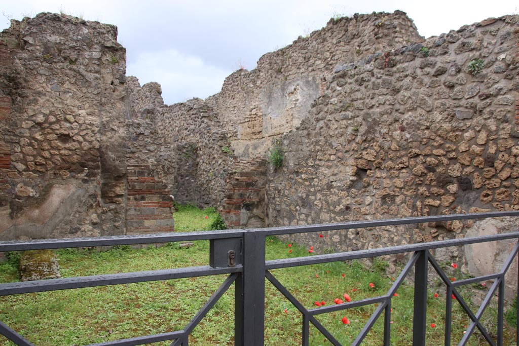 VIII.3.7 Pompeii. May 2024. Looking towards doorway to rear room in south-west corner of shop. Photo courtesy of Klaus Heese.